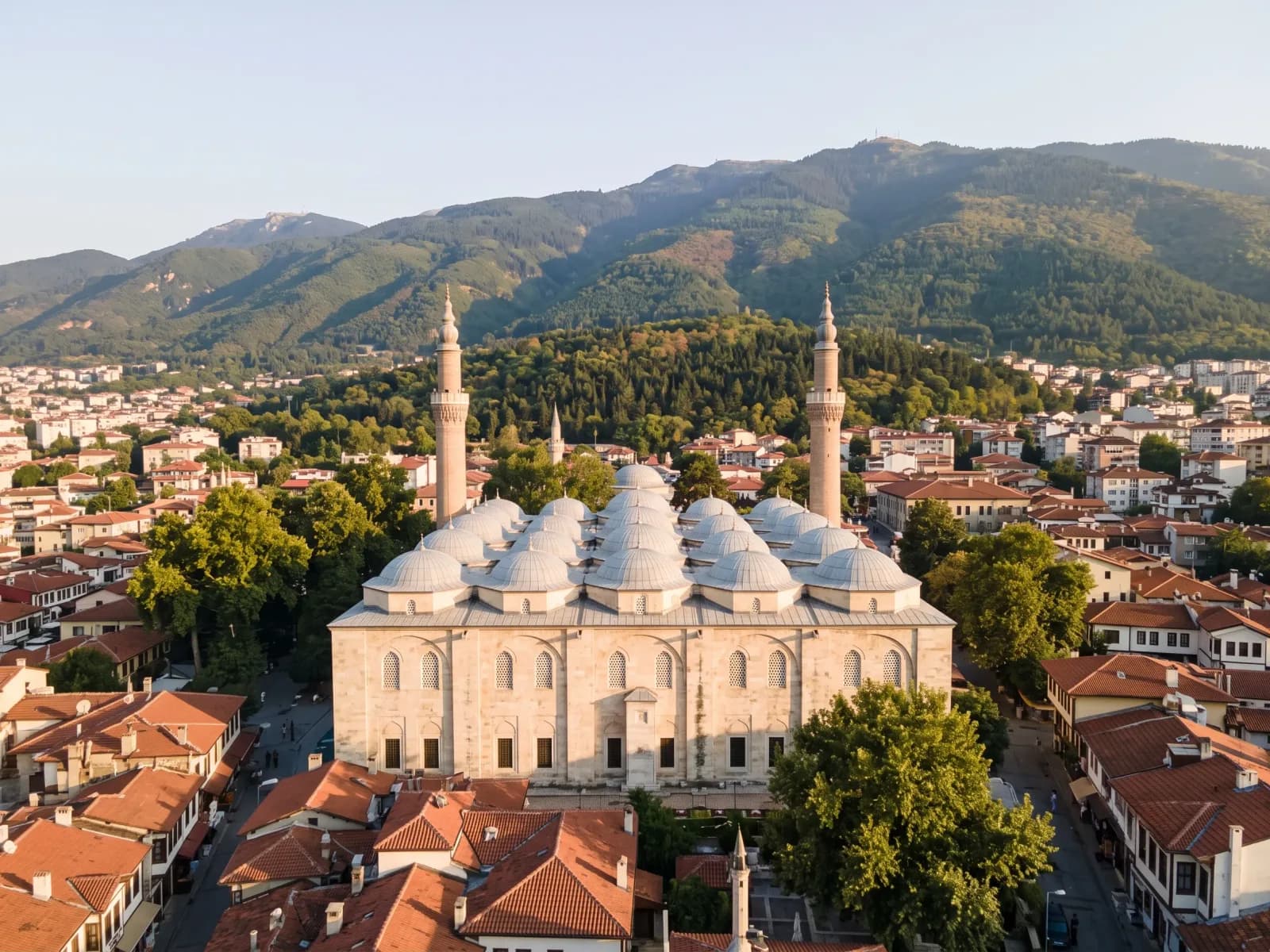 The many domes of the Bursa Grand Mosque above the old city, with Mount Uludağ rising behind